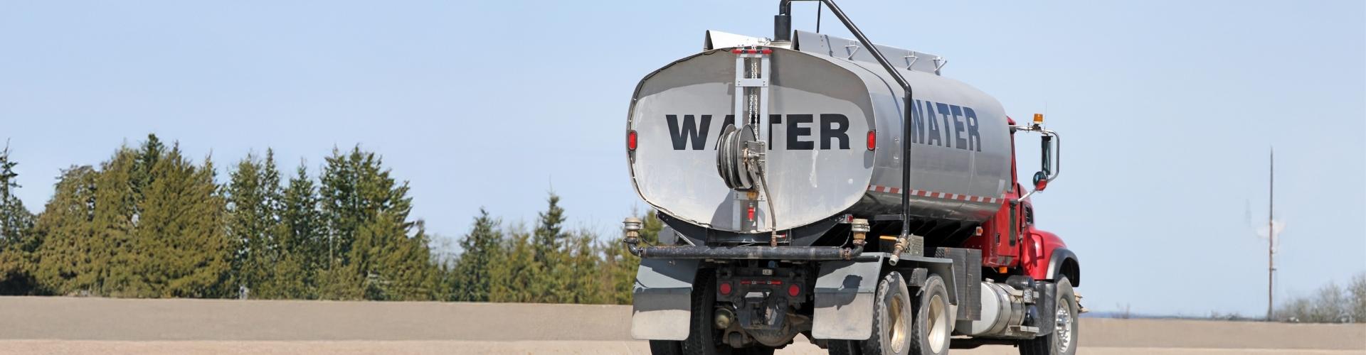 Water tanker truck delivering emergency potable water to commercial sites in Gauteng